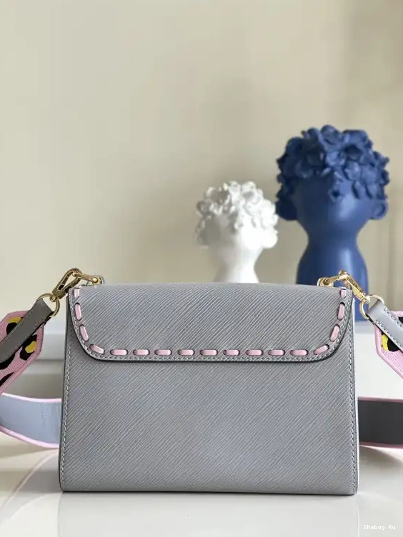 MM VUITTON LOUIS TWIST 0514